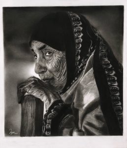 Pencil drawing of an elderly woman wearing a headscarf.