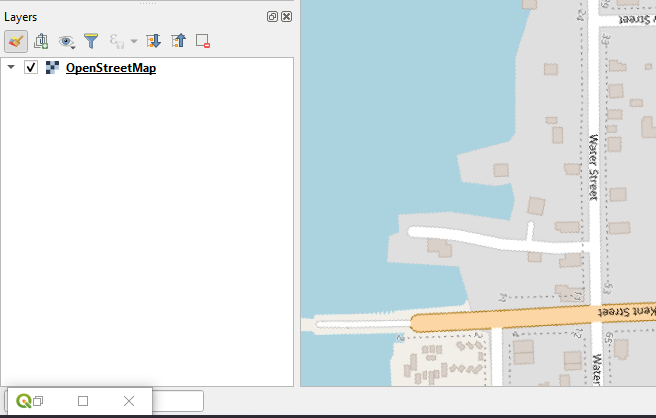 Figure 3.18. This shows the Layers Table of Contents panel on the left hand side of the main QGIS window and the OpenStreetMaps map canvas visible on the right.