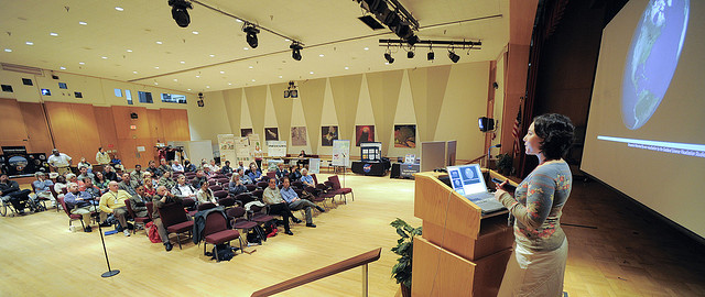 A woman giving a presentation at the NASA Goddard Space Flight Center